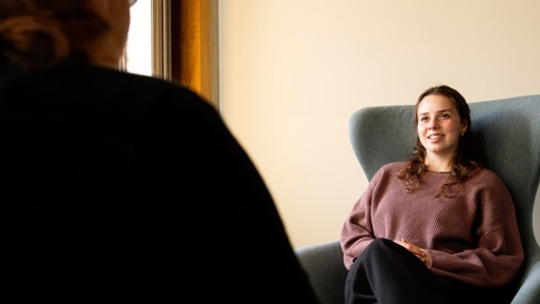 A University student talking to a Student Wellbeing Counsellor at the Student Services Centre.